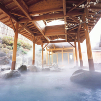 Get some R&R with a soak in the onsen at Hotel Okada